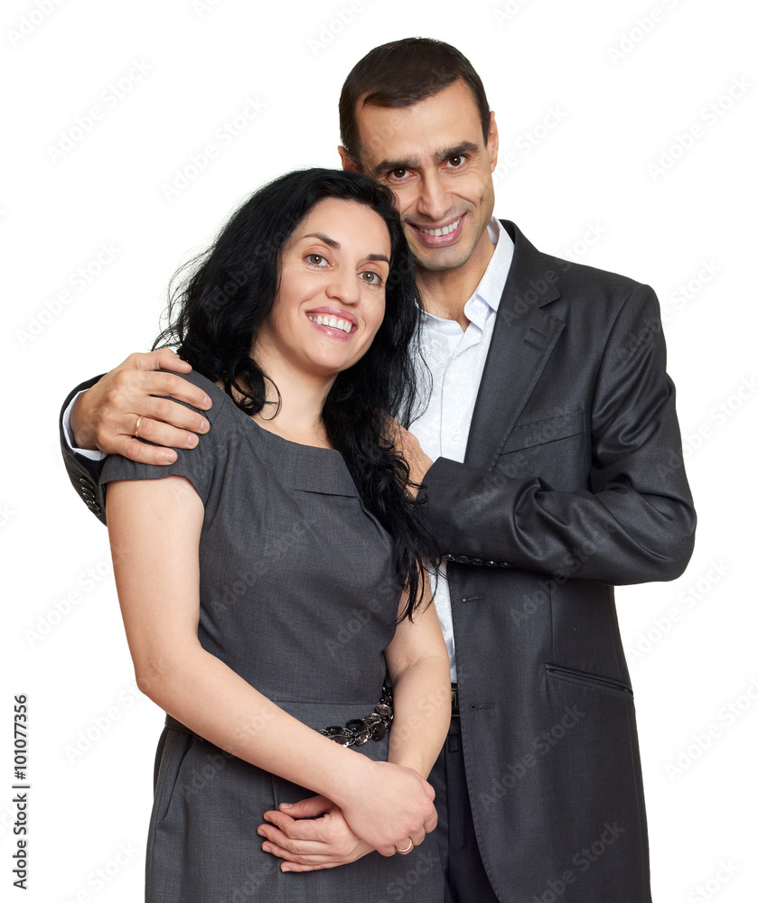 Happy couple dressed in classic clothes, portrait at studio on white Happy couple dressed in classic clothes, portrait at studio on white