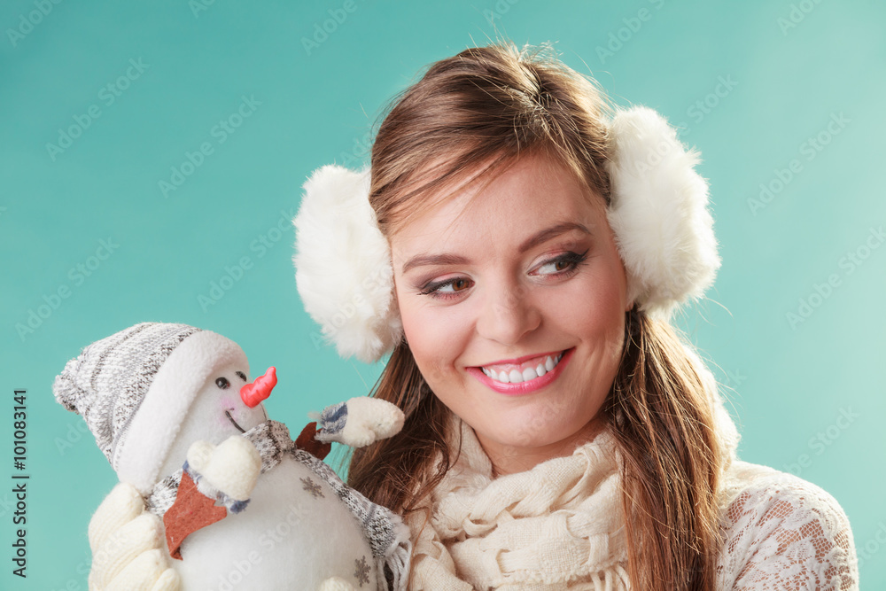 Smiling cute woman with little snowman. Winter. Smiling cute woman with little snowman. Winter.