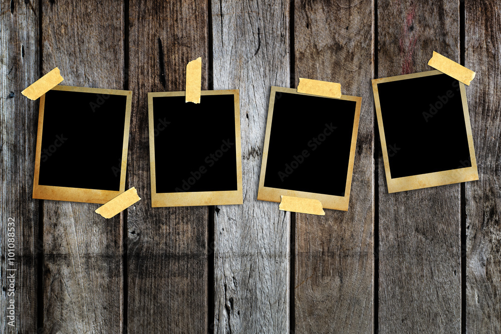 Old photo frame on wood background. Old photo frame on wood background.