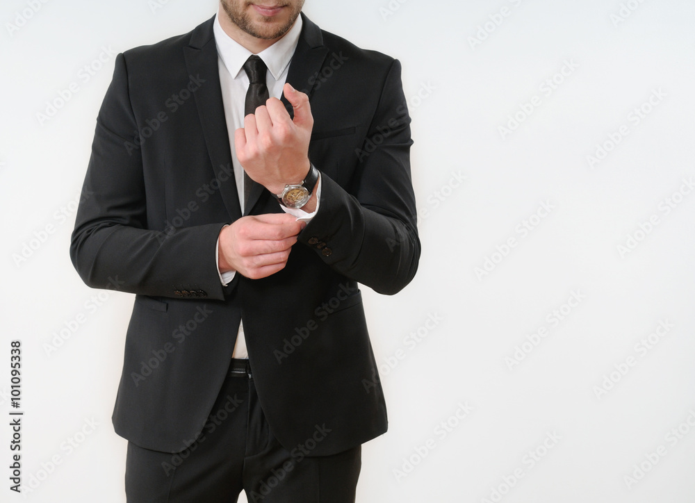 business man body side button up his black suit on white backgro business man body side button up his black suit on white backgro