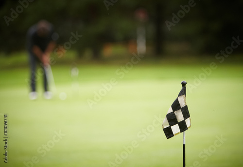 A finish flag on golf field.