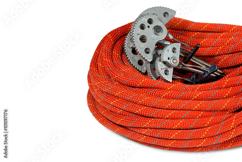 Climbing Equipment on White Background / Rock climbing equipment with two climbing cams (friends) and a red rope. Isolated on white background photo