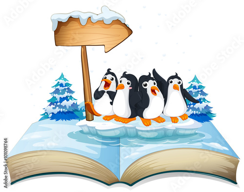 Four penguins standing on ice