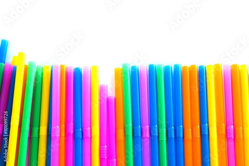 Drinking straw colored plastic tubes isolated on white background