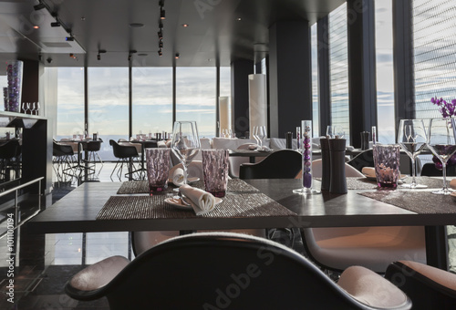glasses on empty restaurant table in restaurant