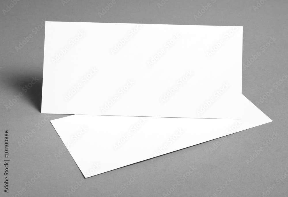 Blank flyer poster over grey background to replace your design. Blank flyer poster over grey background to replace your design.