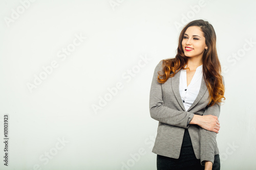 beautiful girl portrait of a business suit white background