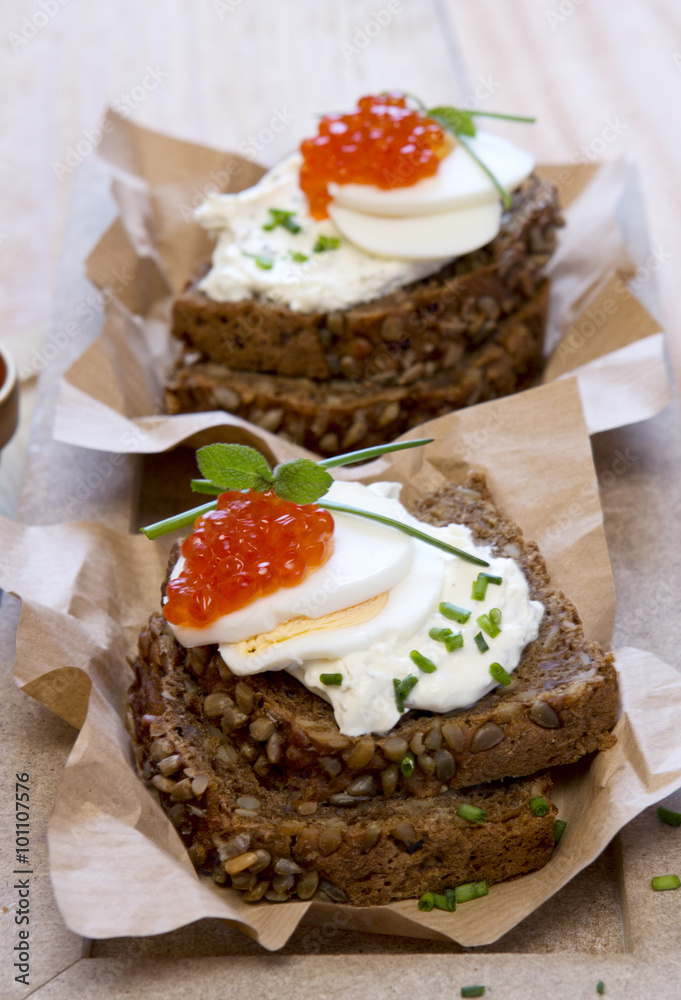 Red caviar with wholemeal bread. Red caviar with wholemeal bread.