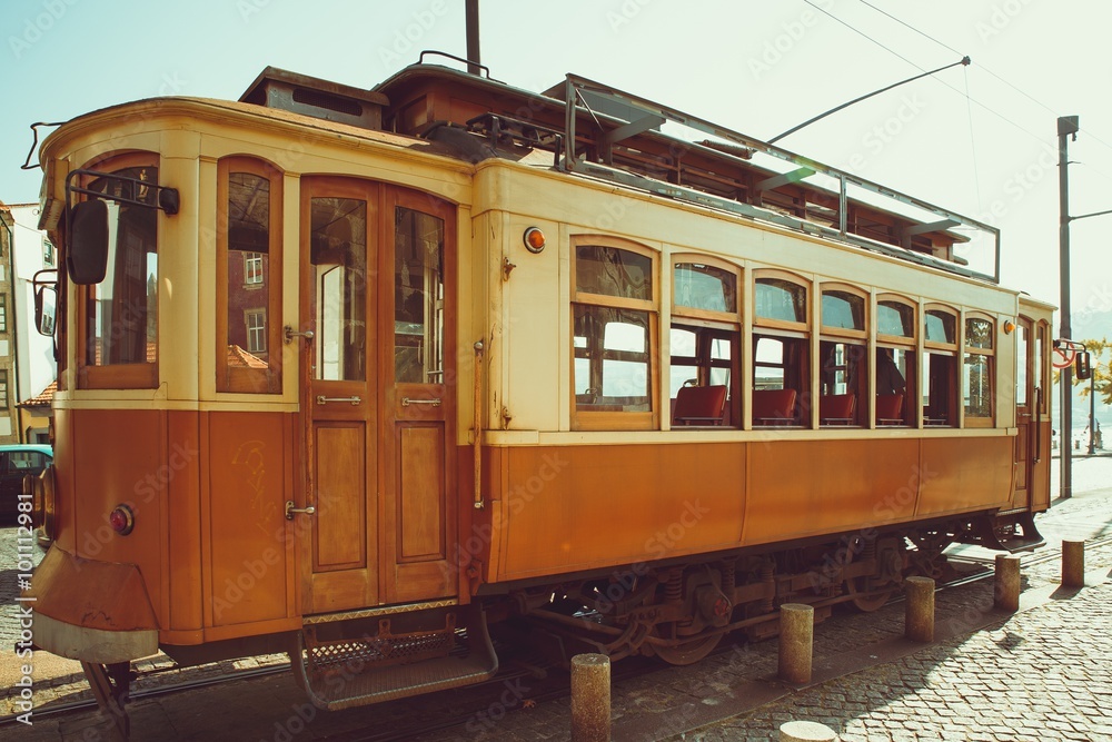 The old fashion Porto yellow streetcar.