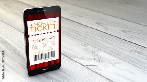 smartphone with cinema e-ticket over white wooden background