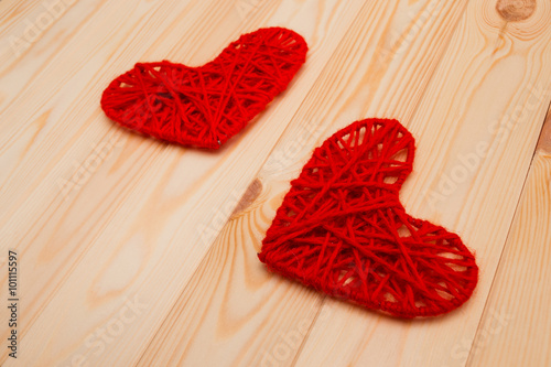 Valentines Day background. Two knitted hearts
