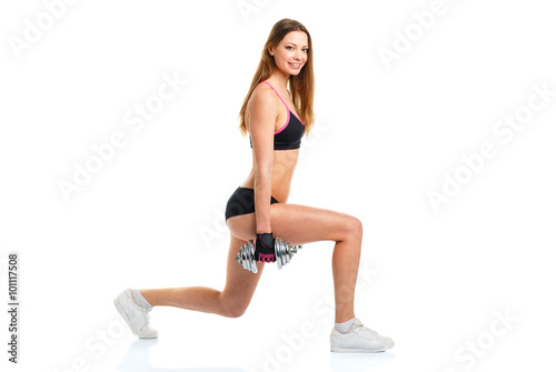 Happy athletic woman with dumbbells doing sport exercise, isolat