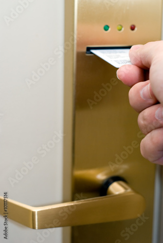 Hand Inserting Hotel Keycard