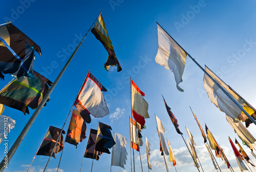 Pilton, UK - June 24, 2009:  Flags blowing in the wind at the 'Glastonbury Festival of Contemporary Performing Arts'