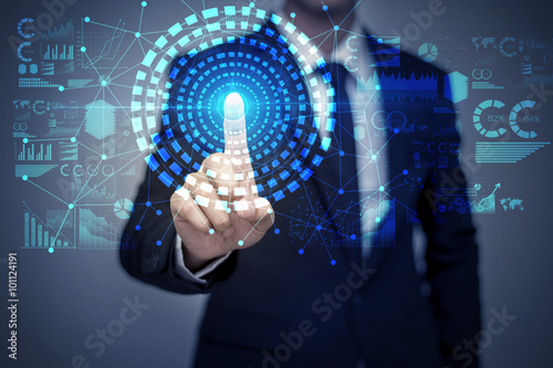 Businessman in suit working with digital virtual screen