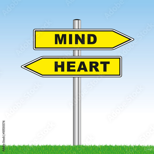 direction sign with mind or heart showing opposite directions