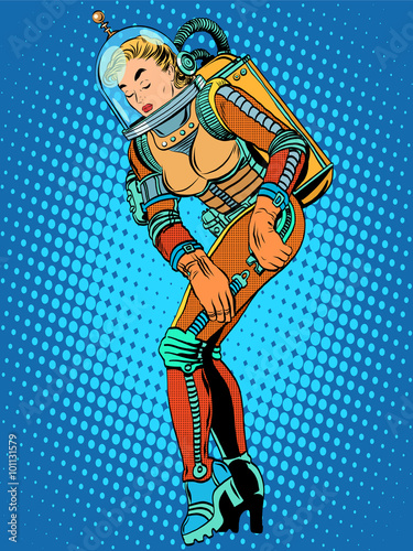Sexy beautiful girl astronaut in a spacesuit