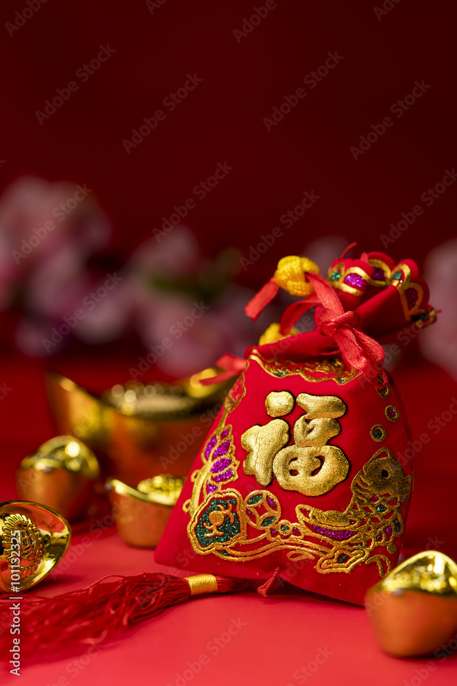 Chinese new year decorations, Auspicious ornaments on red backgr Chinese new year decorations, Auspicious ornaments on red backgr