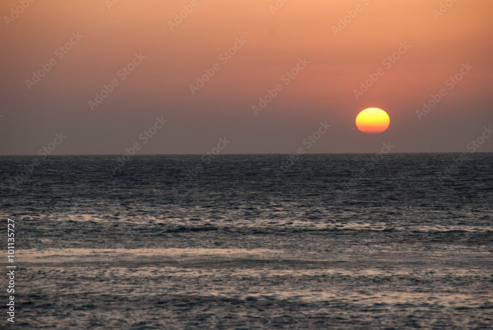 red sun and sea at sunset
