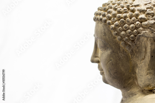 Buddha statue close up on a white background 