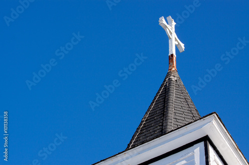 Fototapete church steeple with blue sky and cross