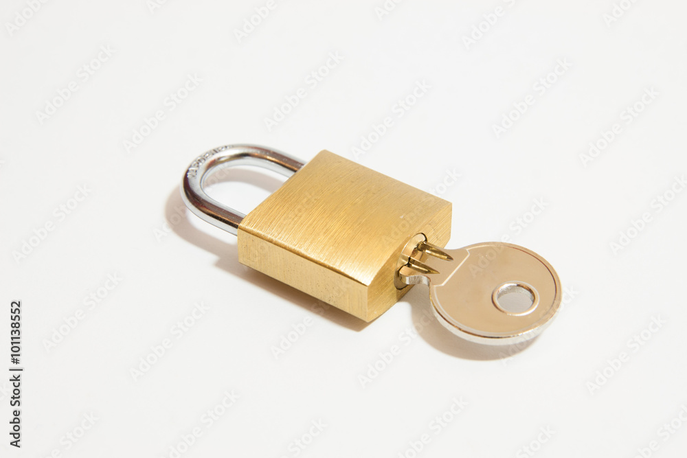 Padlock with key on a white background Padlock with key on a white background