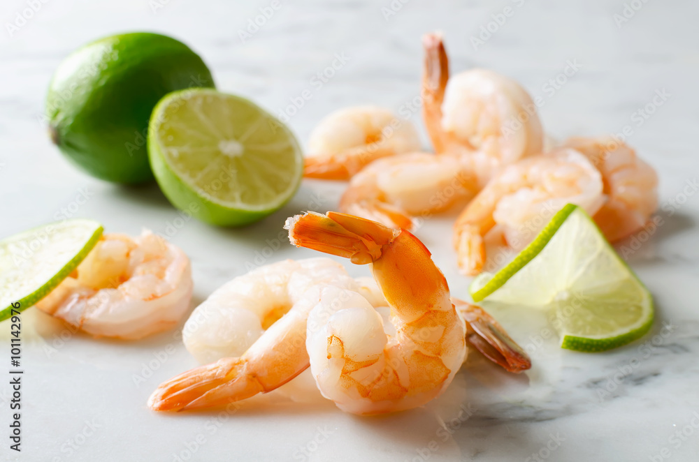 Shrimp with lime on a marble table Shrimp with lime on a marble table