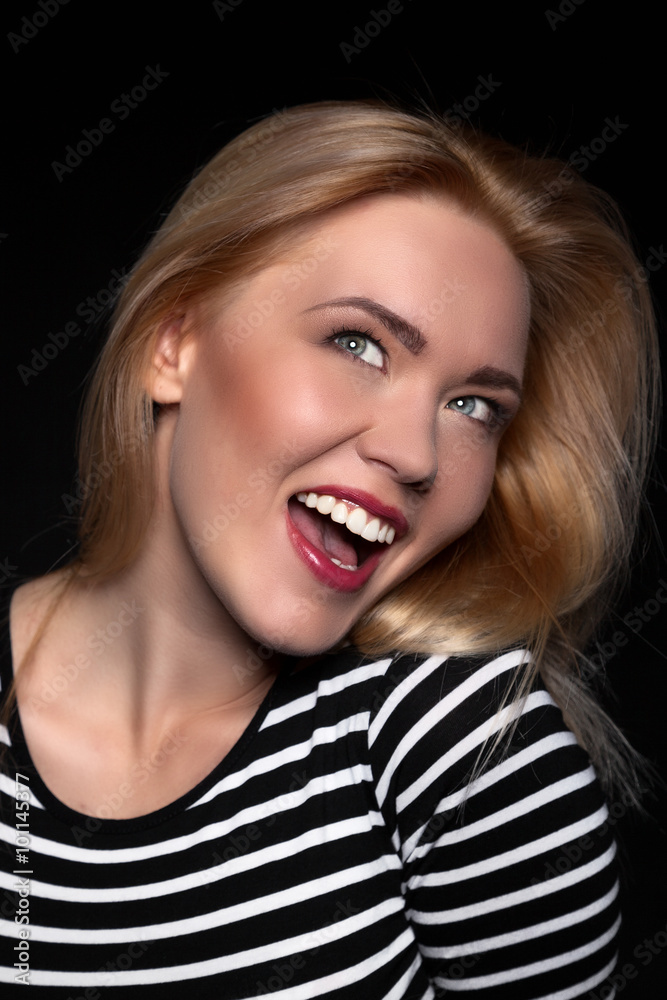 Portrait of a Beautiful Blonde Woman Model black background studio - Stock Image Portrait of a Beautiful Blonde Woman Model black background studio - Stock Image