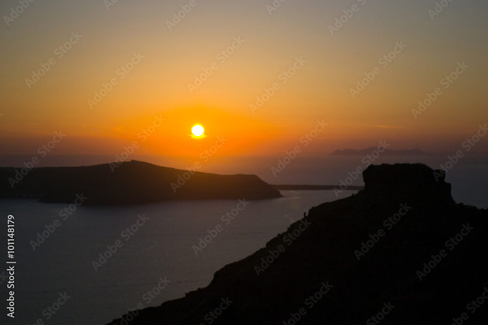 Spectacular romantic sunset seen from the island of Santorini