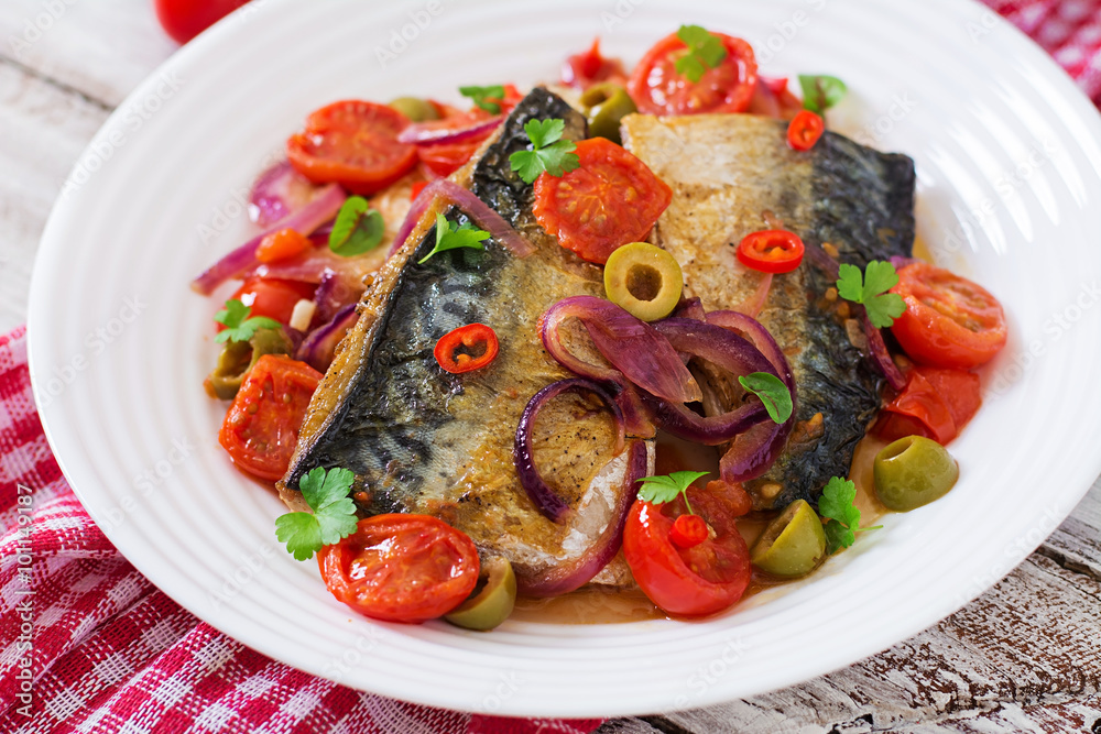 Grilled mackerel with vegetables in Mediterranean style Grilled mackerel with vegetables in Mediterranean style