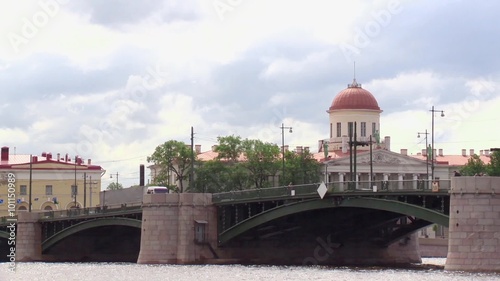 View of a bridge from the river in summer cloud day photo