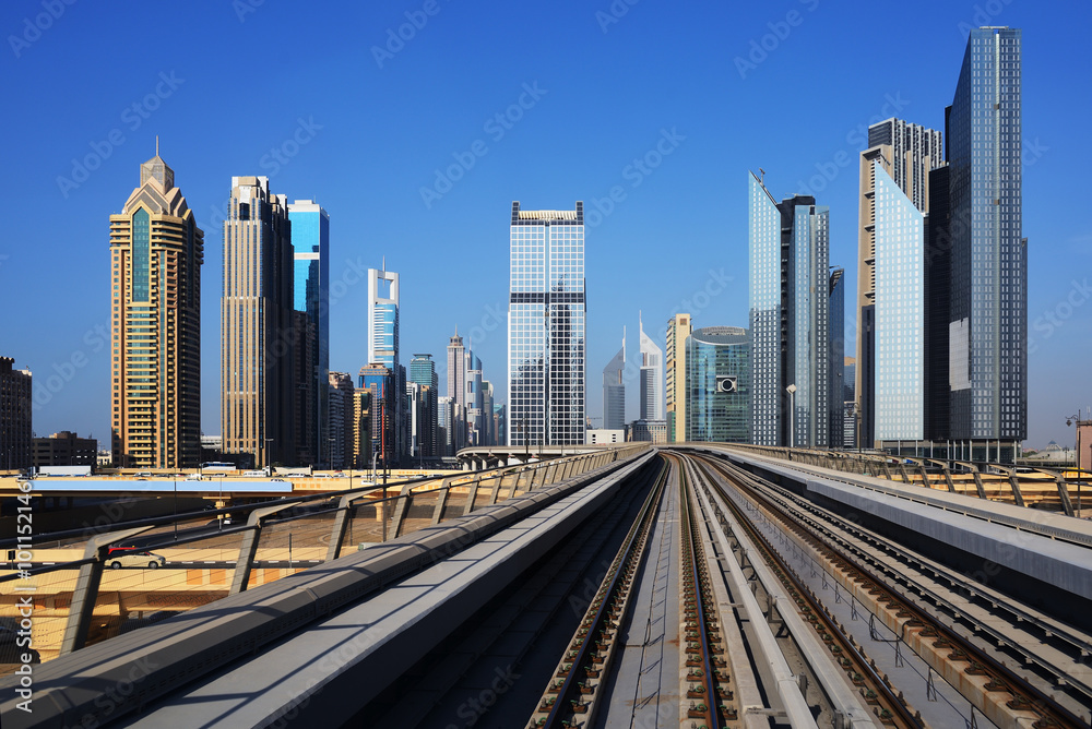 Metro on the background of skyscrapers of Dubai World Trade cent
