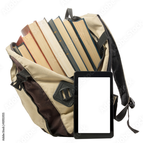 Stack of colorful books and electronic book reader. Electronic library concept. Back to school. Copy space