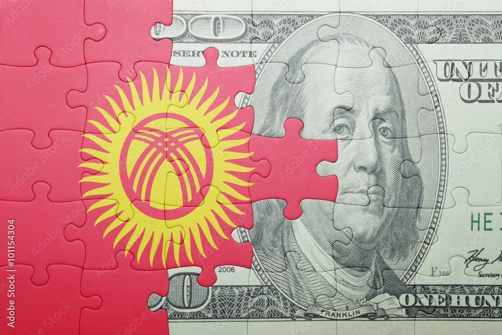puzzle with the national flag of kyrgyzstan and dollar banknote