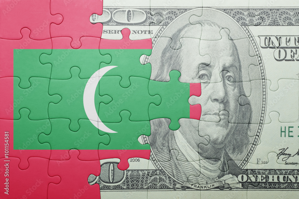 puzzle with the national flag of maldives and dollar banknote