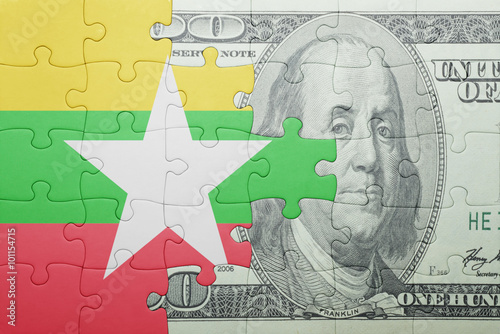 Wallpaper Mural puzzle with the national flag of myanmar and dollar banknote Torontodigital.ca