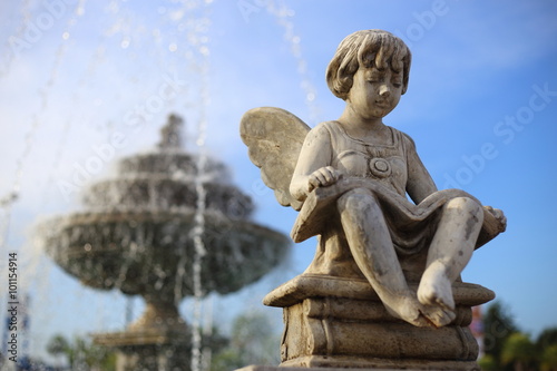 Baby Angel sculpture with a fountain