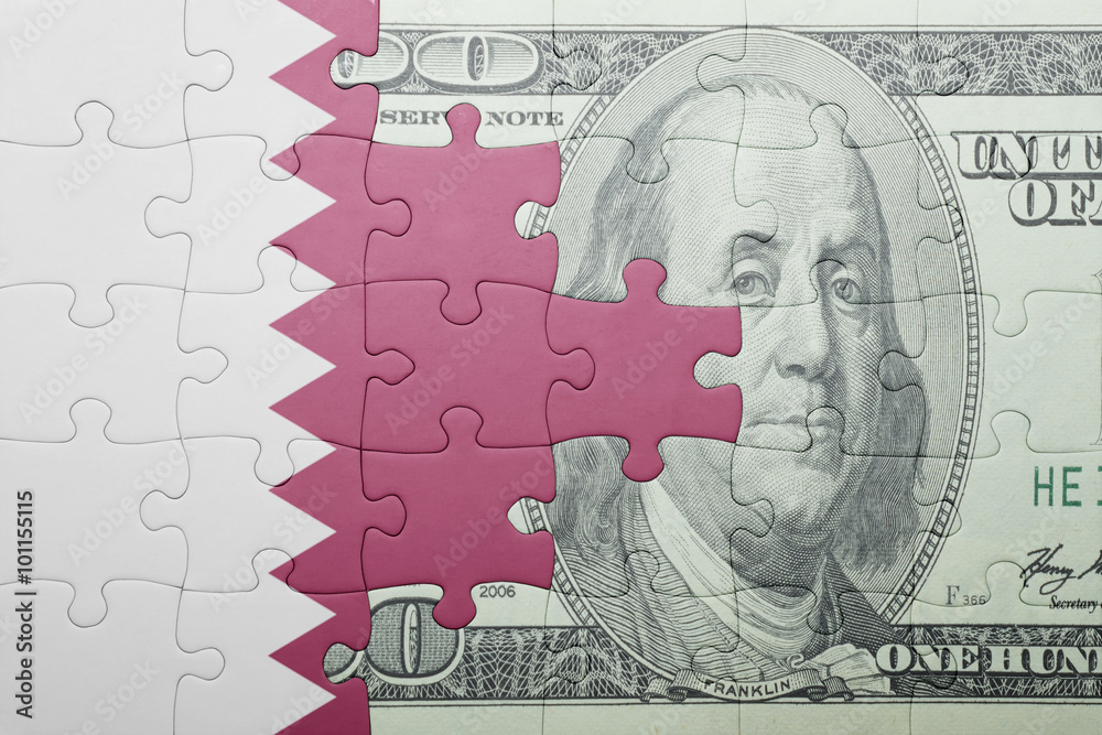 puzzle with the national flag of qatar and dollar banknote