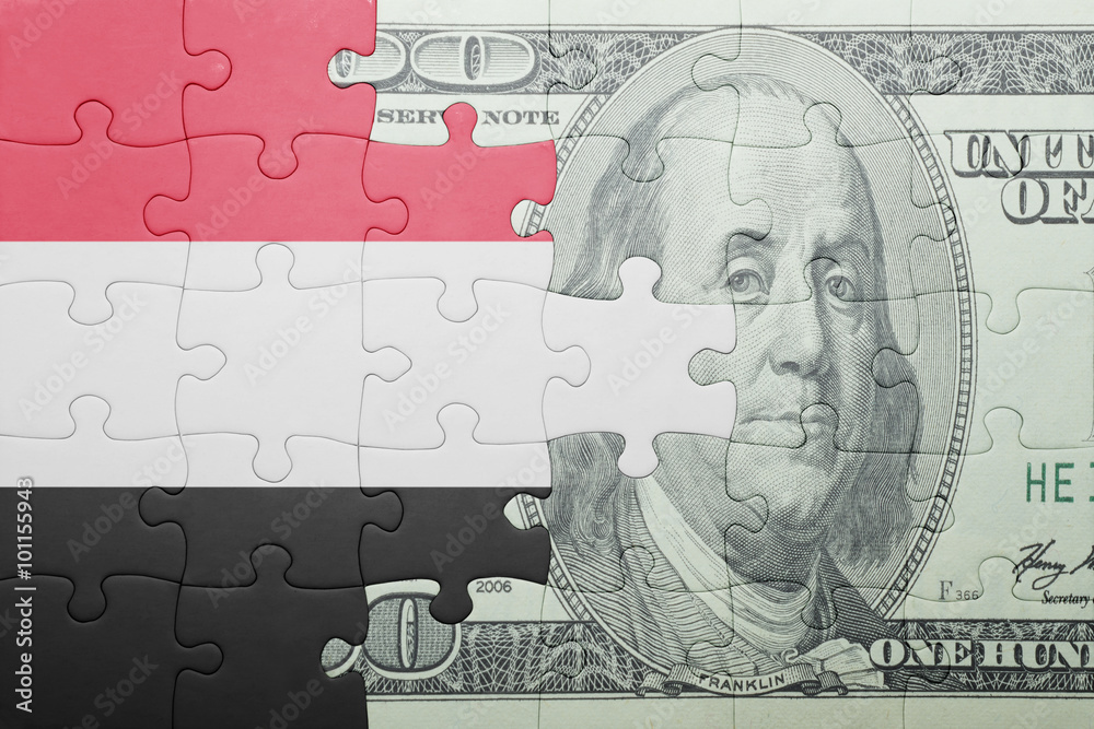 puzzle with the national flag of yemen and dollar banknote