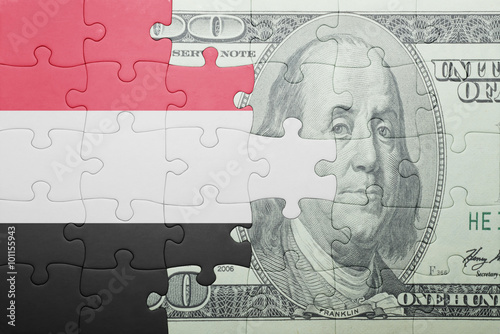 Wallpaper Mural puzzle with the national flag of yemen and dollar banknote Torontodigital.ca