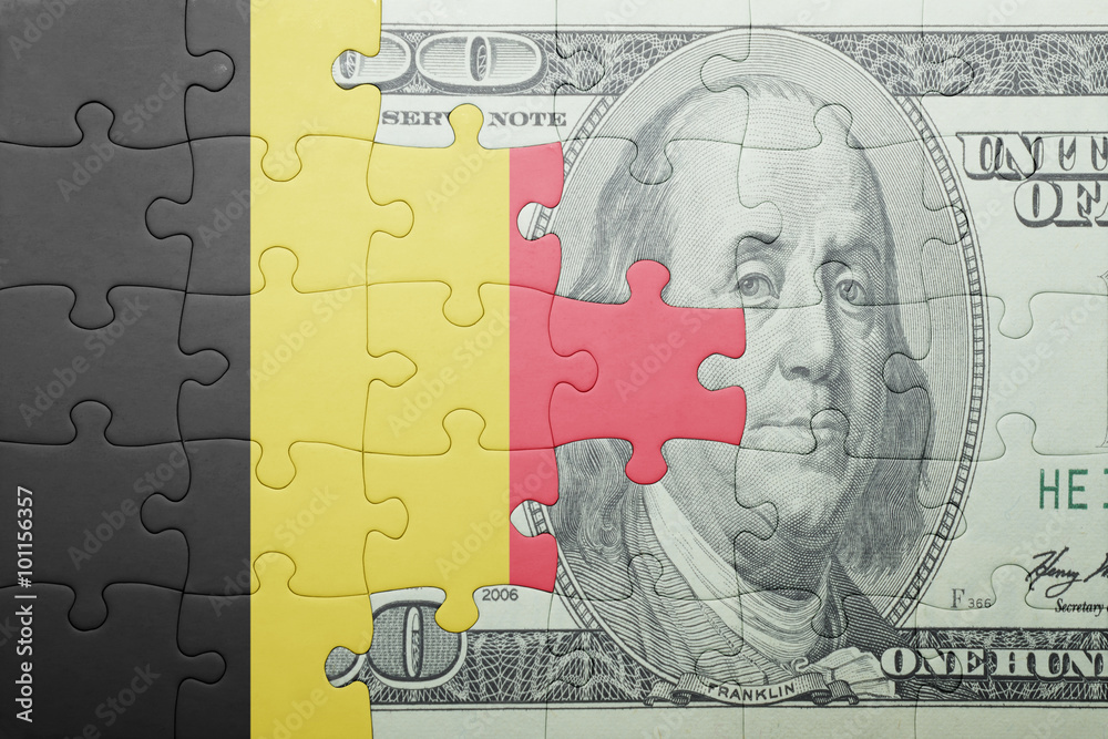 Obraz premium puzzle with the national flag of belgium and dollar banknote