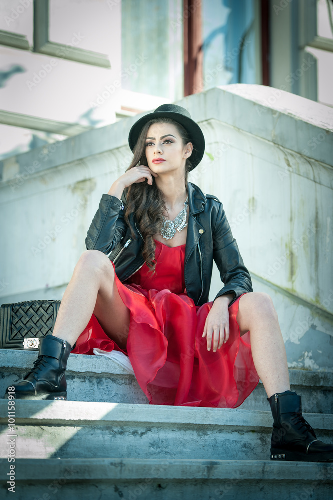 Red dress shop with black boots