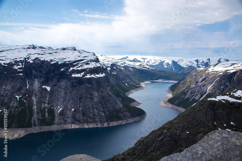 Norway hiking trail - path to Trolltunga (Troll's Tongue) rock in Hordaland county. Ringedalsvatnet lake.