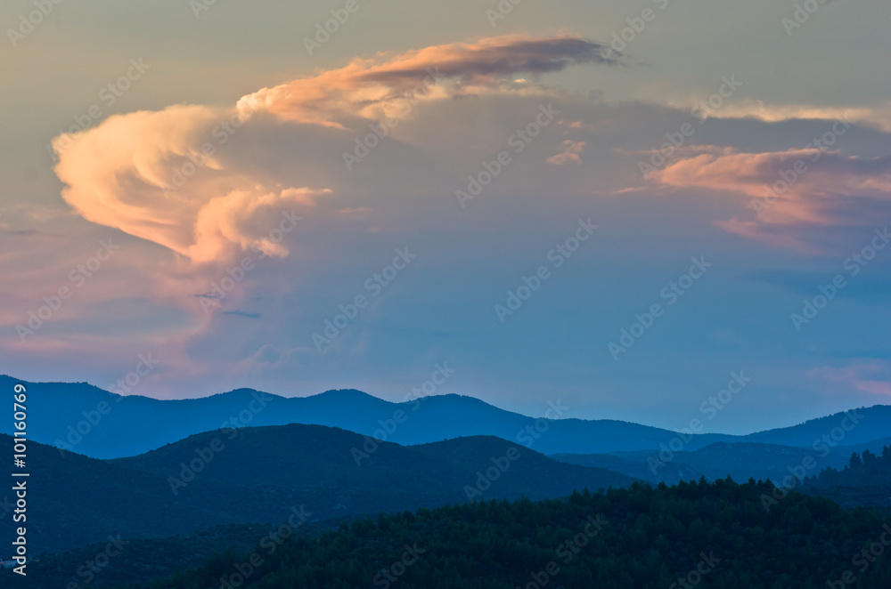 Fototapeta premium Sunlight reflected on clouds after sunset, west coast of Sithonia, Greece