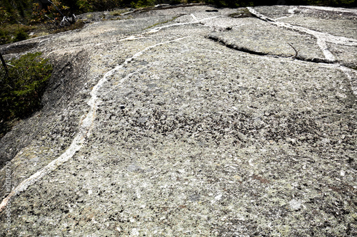 Glacial grooves in granite bedrock, legacy of the ice age.