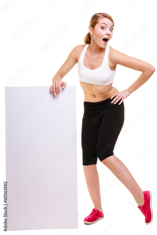 Fitness sporty woman holding blank empty ad banner Fitness sporty woman holding blank empty ad banner