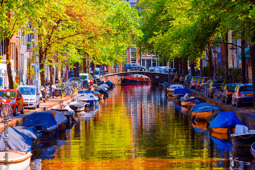 Beautiful canal in the old city of Amsterdam, Netherlands, North Holland province.