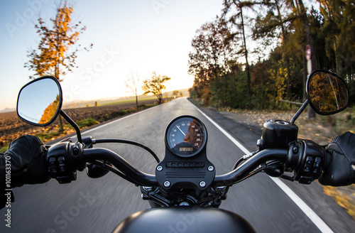 The view over the handlebars of motorcycle