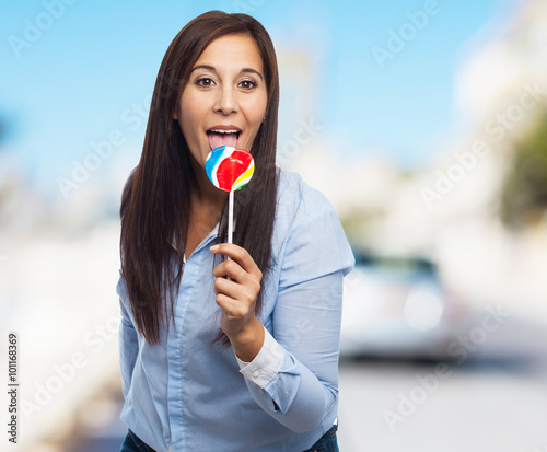 cool young woman with candy