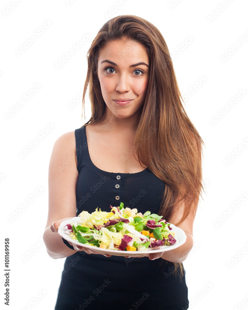 portrait of a young woman holding a fresh salad portrait of a young woman holding a fresh salad